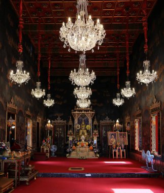 The Ancient Buddha statue install as The principal in Church at Buddhist temple.