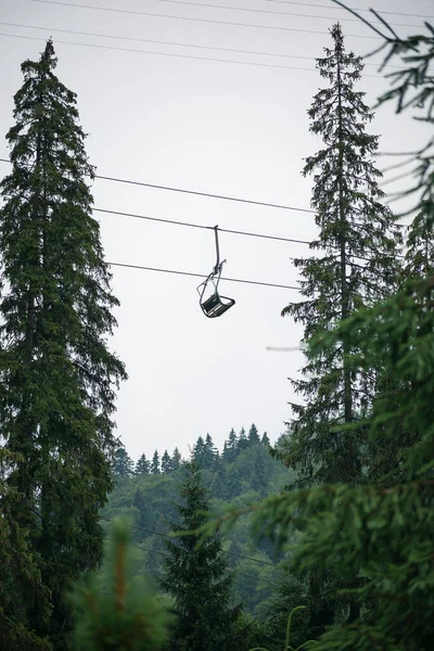 lift in the mountains. ski lift at the ski resort, designed to climb to the top of the mountain skiers and snowboarders.