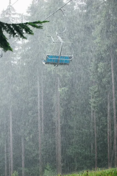 lift in the mountains. lift during heavy rain. rain in the forest