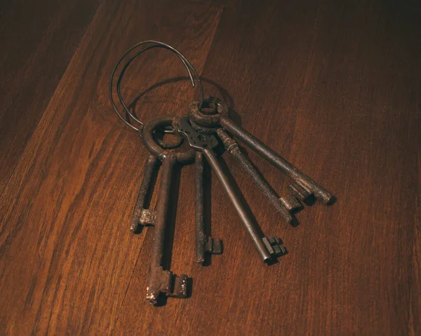 on the table lies a bundle of ancient keys