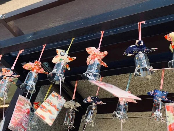 A wind chime rang on the balcony of the house as the wind blew in japan