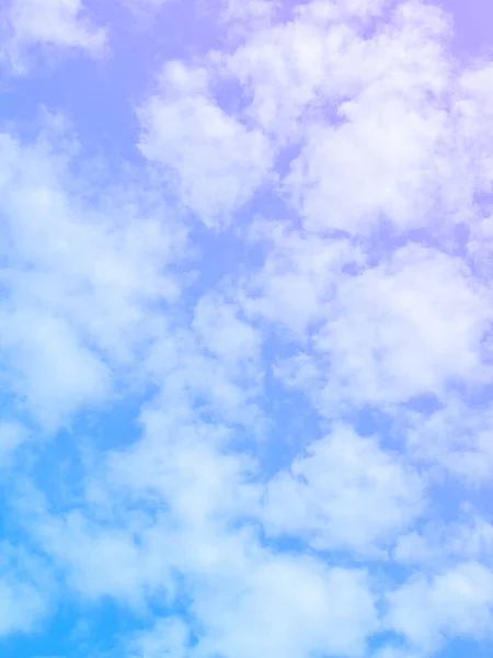 cloud and sky with a blue and purple colored background