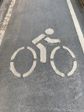 Bicycle lane sign on asphalt