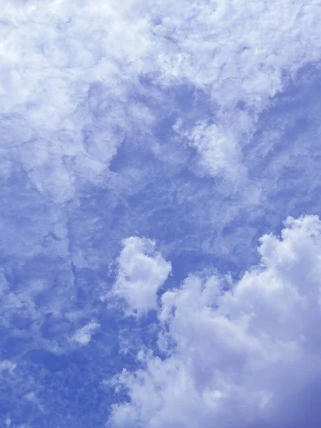 Abstract clouds and sky with purple background