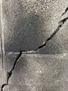 Çatlak gri tuğla duvar arka planı