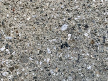 Çimento arka planı kum ve çakıldan oluşur..