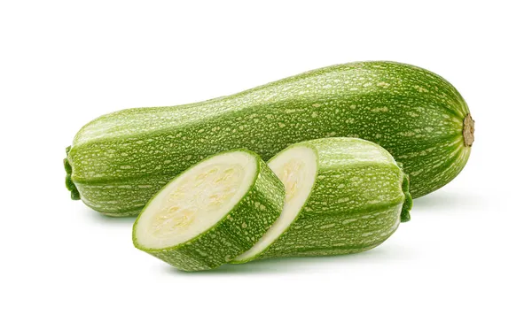 Grüne Zucchini mit Scheibe isoliert auf weißem Hintergrund — Stockfoto