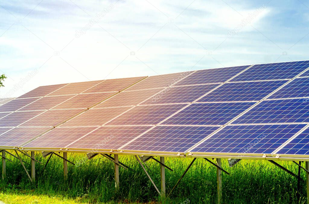 Solar panels in field. Solar energy. Alternative source of electricity.
