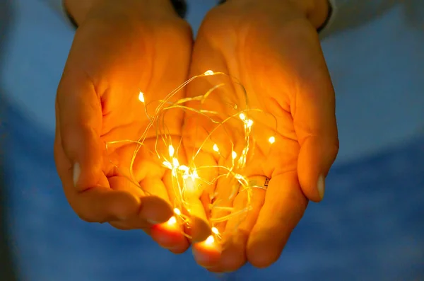 Garland Glowing Women Hands Holiday Lights Palms Cosiness — Foto de Stock