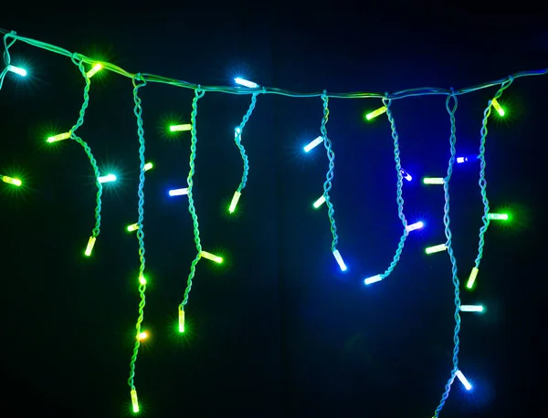 Colored Christmas Garlands Black Background — Stock Photo, Image