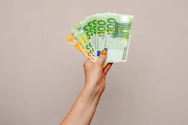 Woman Holds Euro Cash Hand Light Background — Photo