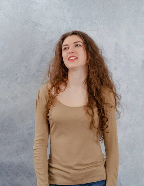 Cute Girl Laughs Looks Away Long Curly Dark Hair Cute — Stock Photo, Image