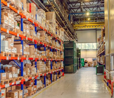 Background cardboard boxes inside warehouse. Logistics center. The composition filled with cardboard boxes