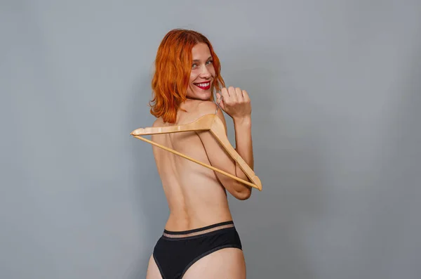 Sender Red Haired Woman Laughs Woman Empty Hanger Black Panties — Stock Photo, Image