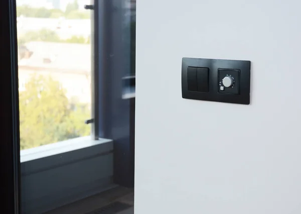 Close Modern Elegant Black Light Switch Climate Temperature Control Panel — Stok fotoğraf