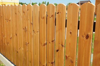 Wooden Fence. House garden wooden fence close up.
