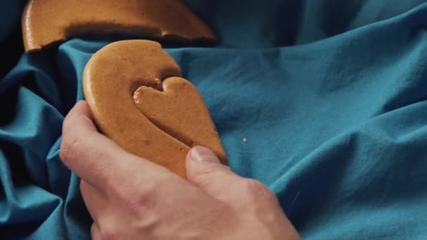 Mens Hands Break Brown Sugar Caramel Candy Cookies Shape Heart — Stock Video