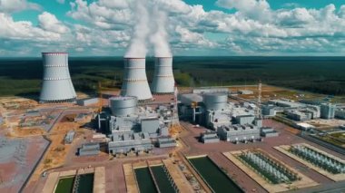 Power units and cooling towers with steam and smoke from a nuclear power plant 