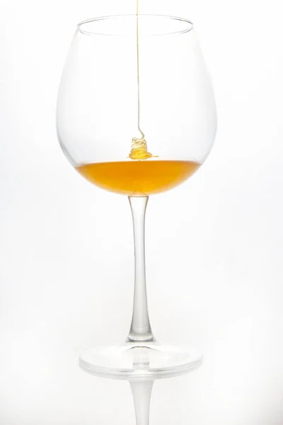 Honey Flows Wine Glass White Background Vitamin Organic Food — Stock Photo, Image