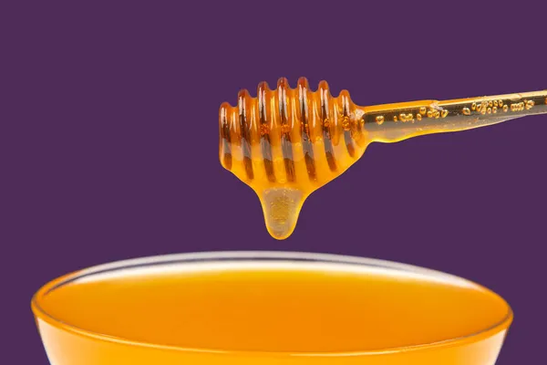 Frischer Duftender Honig Der Von Einem Löffel Einen Teller Auf — Stockfoto