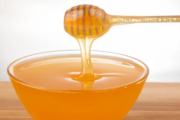 Miel Frais Parfumé Goutte Une Cuillère Dans Une Assiette Nutrition Photos De Stock Libres De Droits