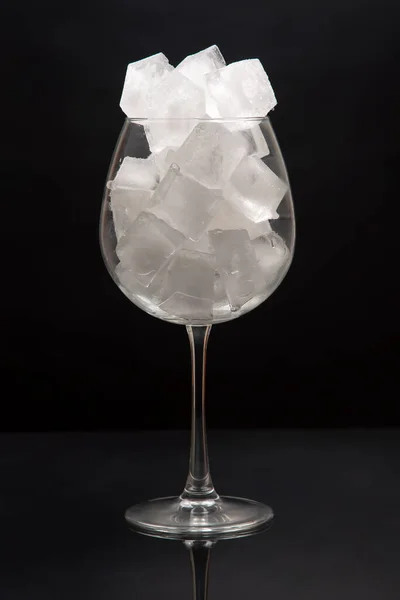 Frozen Ice Cubes Empty Wine Glass Dark Background — Stock Photo, Image