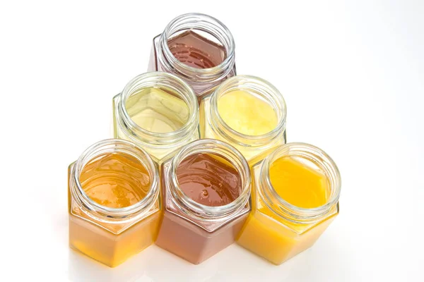 Hexagonal Jars Different Types Colors Fresh Flower Honey Vitamin Food — Stock Photo, Image