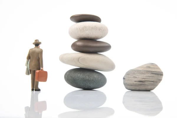 Miniature People Business Man Stands Stone Pyramid White Background Life — Foto de Stock