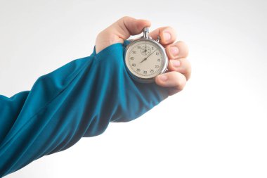 hand with a mechanical stopwatch on a white background. Time part precision. Measurement of the speed interval