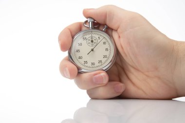 hand with a mechanical stopwatch on a white background.
