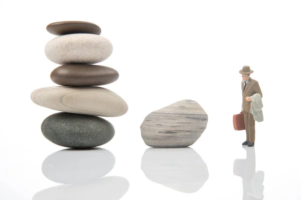 Miniature People Business Man Stands Stone Pyramid White Background Life — Foto Stock