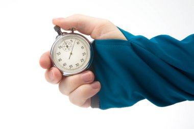 hand with a mechanical stopwatch on a white background. Time part precision. Measurement of the speed interval