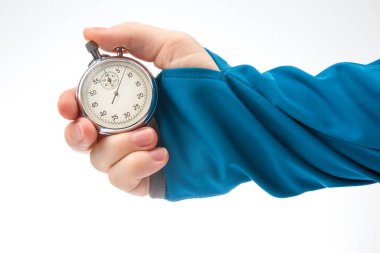 hand with a mechanical stopwatch on a white background. Time part precision. Measurement of the speed interval