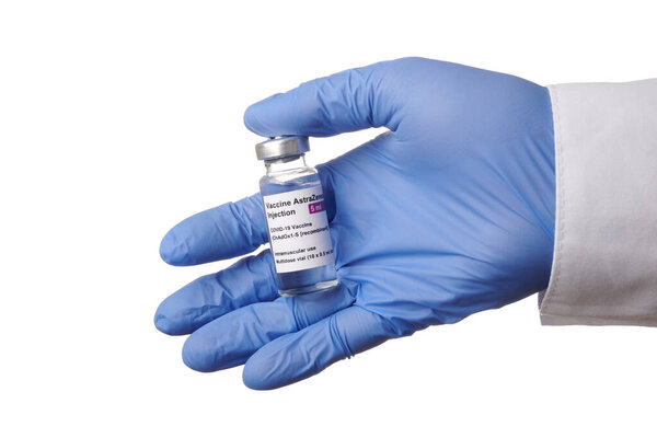 Doctor Hand Takes Astrazeneca Vaccine Vial - Isolated Photo