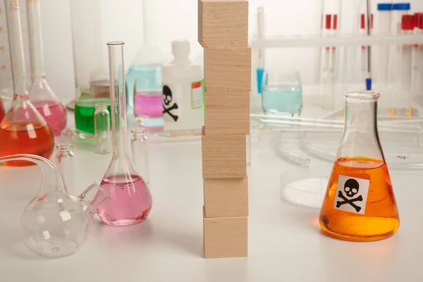 Vertical Wooden Cubes with Toxic Substances - Labs Photo — Stock Photo, Image