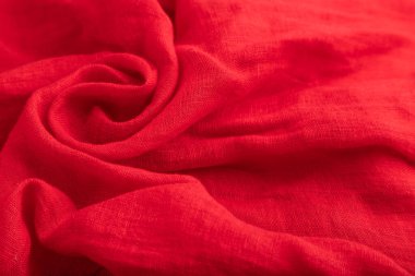 Kırmızı ipek doku parçası. Yan görünüş, doğal tekstil arka plan ve doku. dalga konsepti, soyut, sarmal biçim.