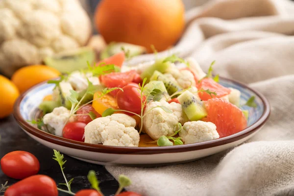 Vegetarian Salad Cauliflower Cabbage Kiwi Tomatoes Microgreen Sprouts Black Concrete Stock Photo