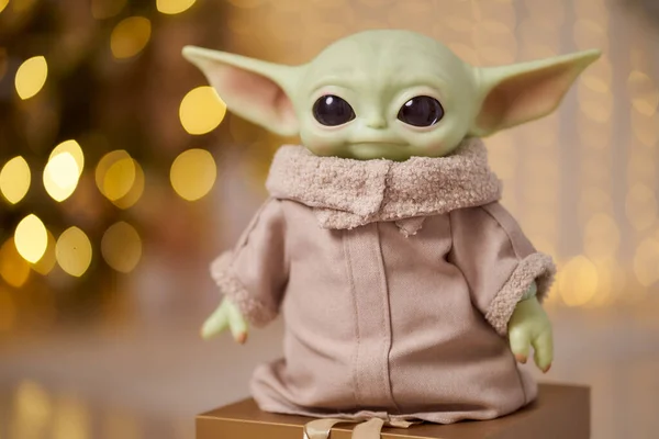 November, 2021: Baby Yoda, an action figures of Mandalorian with christmas decoration interior. Bokeh effect — Stock Photo, Image