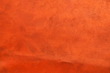 Koyu turuncu taklit deri dokusundan bir fotoğraf stüdyosu