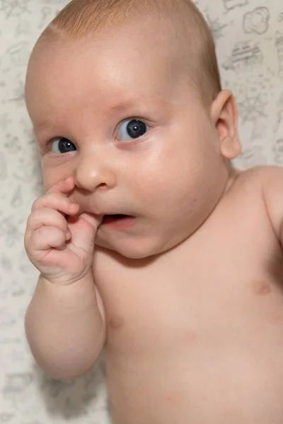 Cute Three Month Old Baby Eating His Hand Teething — стоковое фото