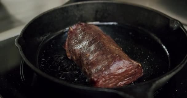 Roast grilling tenderloin fresh juicy beef filet with lines slow motion — Stock Video