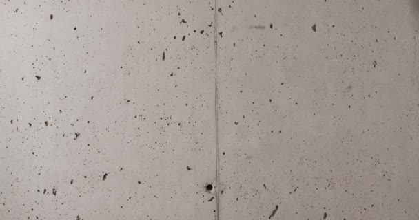 Betonnen textuur gefilmd in een minimalistisch interieur, grijs Textuur, achtergrond — Stockvideo