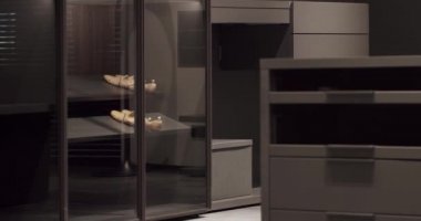 Dressing room with things. Elegant Wooden Built Walk In Closet Decoration.