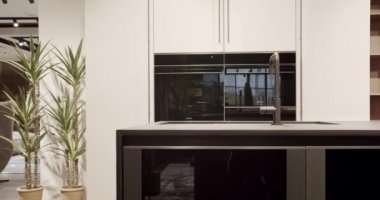 Modern Kitchen room with minimalist dining table. Modern Minimalist Home.