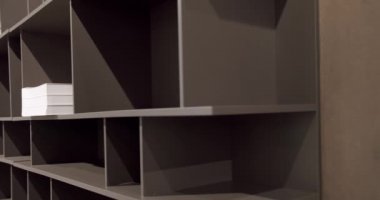 Modern Furniture and cozy design. Home modern black shelf. Modern interior.
