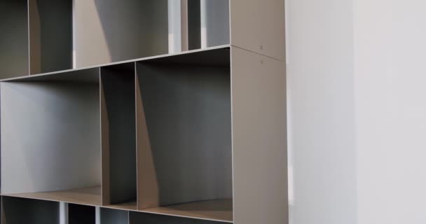 Modern Furniture and cozy design. Home modern black shelf. Shelves with home — Vídeos de Stock