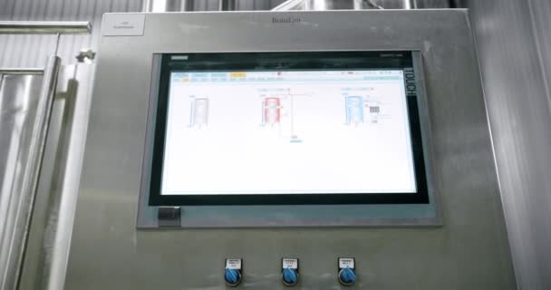 Industrial control panel display on the window factory. Brewing equipment. — Video