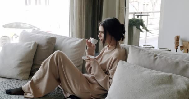 Woman rests at home. healthy calm lady relaxing on comfortable sofa — Vídeos de Stock