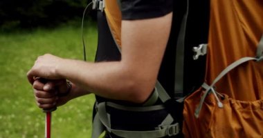 Concept of walking and reaching goals. Urban nomad adventure on hitchhiking trip. Man hiking or camping in wilderness walk on path or trail. Outdoors lifestyle.