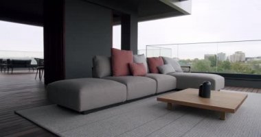 Modern real terrace, in luxury house with beautiful furniture and sliding door, Modern real apartment with sliding door, beautiful furniture. Minimalist modern black gray and white design interior.